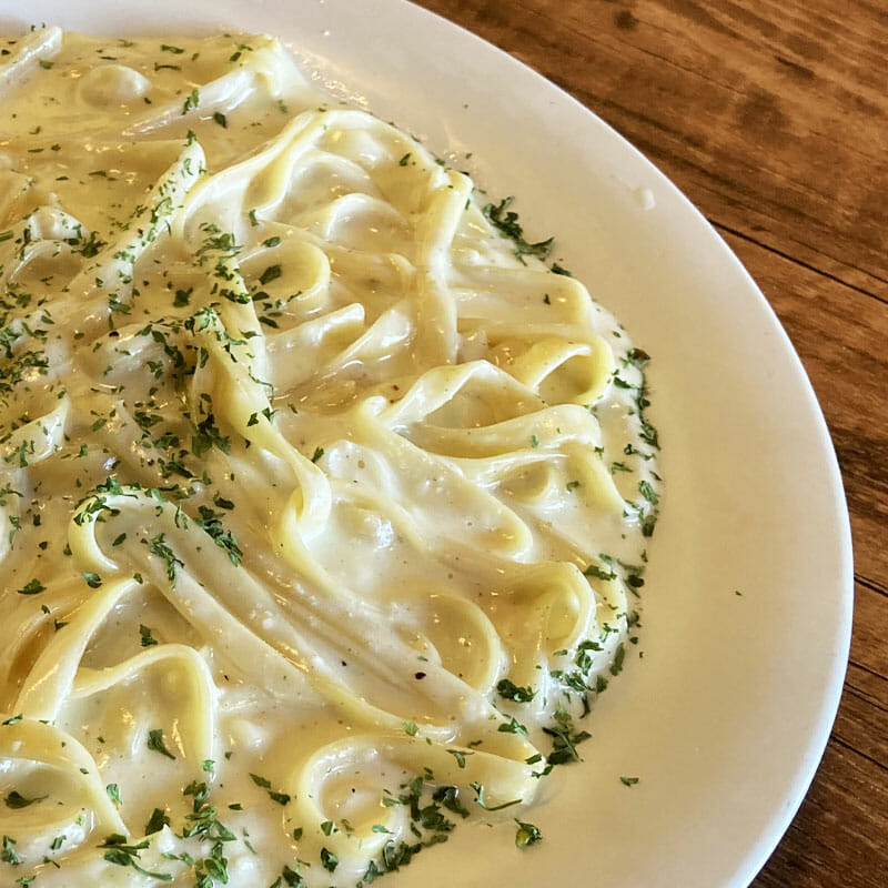 <center></p>
<h2 style=“font-size:16px;color:#fff;”>Fettuccini Alfredo</h2>
<p>Scrumptious pasta served with a rich and  creamy Alfredo sauce.</center>