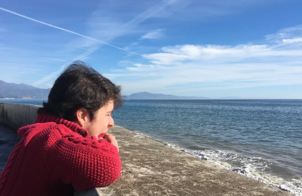 Tom at the beach for the List and Calendar